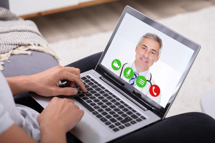 Telemedicine, Doctor on computer screen doing a virtual appointment